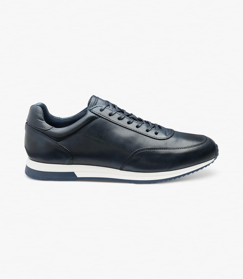 A detailed image of the Bannister-DIS Navy Painted Oxford Sneaker from the side, highlighting the elegant hand-painted leather and the sleek profile. The durable cemented trainer rubber sole is clearly visible, ensuring style and functionality.