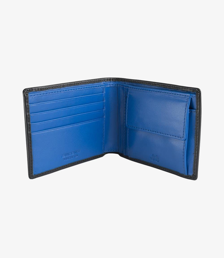 The Loake Barclay Black Leather Wallet is open, revealing its thoughtfully designed interior. The wallet features four card slots, neatly lined in a contrasting blue fabric that adds a stylish pop of color. There is a central coin pouch, easily accessible for storing loose change, which is also lined with the same blue material. The leather interior is soft and supple, ensuring durability and a luxurious feel. The overall layout is practical yet elegant, making it easy to organize your essentials