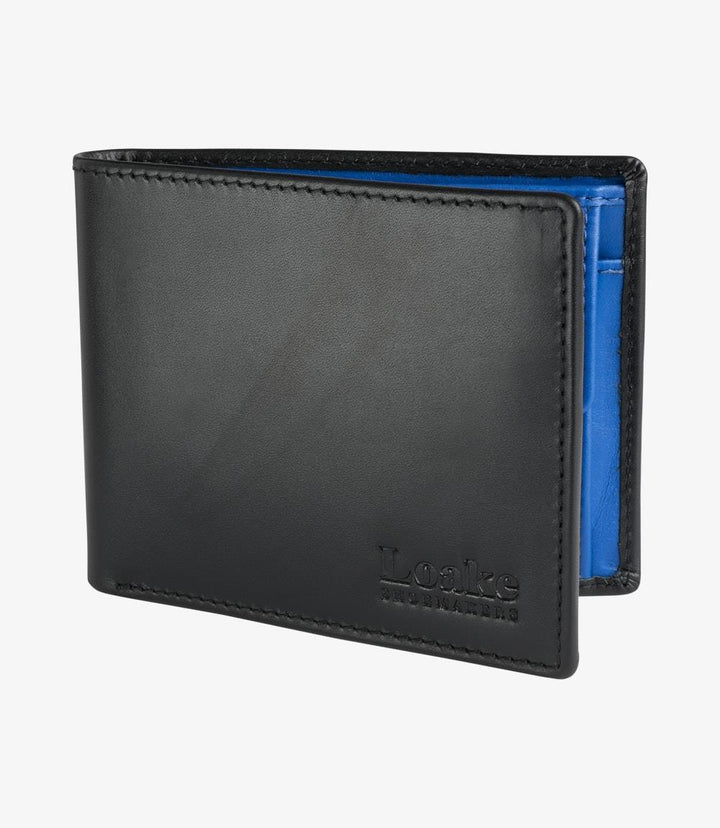 The Loake Barclay Black Leather Wallet is elegantly closed, showcasing its sleek, minimalist design. Made from high-quality black calf leather, the wallet has a smooth surface that exudes sophistication. The edges are finely stitched, and the wallet features a subtle embossed logo on the front, adding a touch of refinement. The overall silhouette is compact and neat, measuring 12cm x 10cm, making it easy to slip into a pocket or bag.